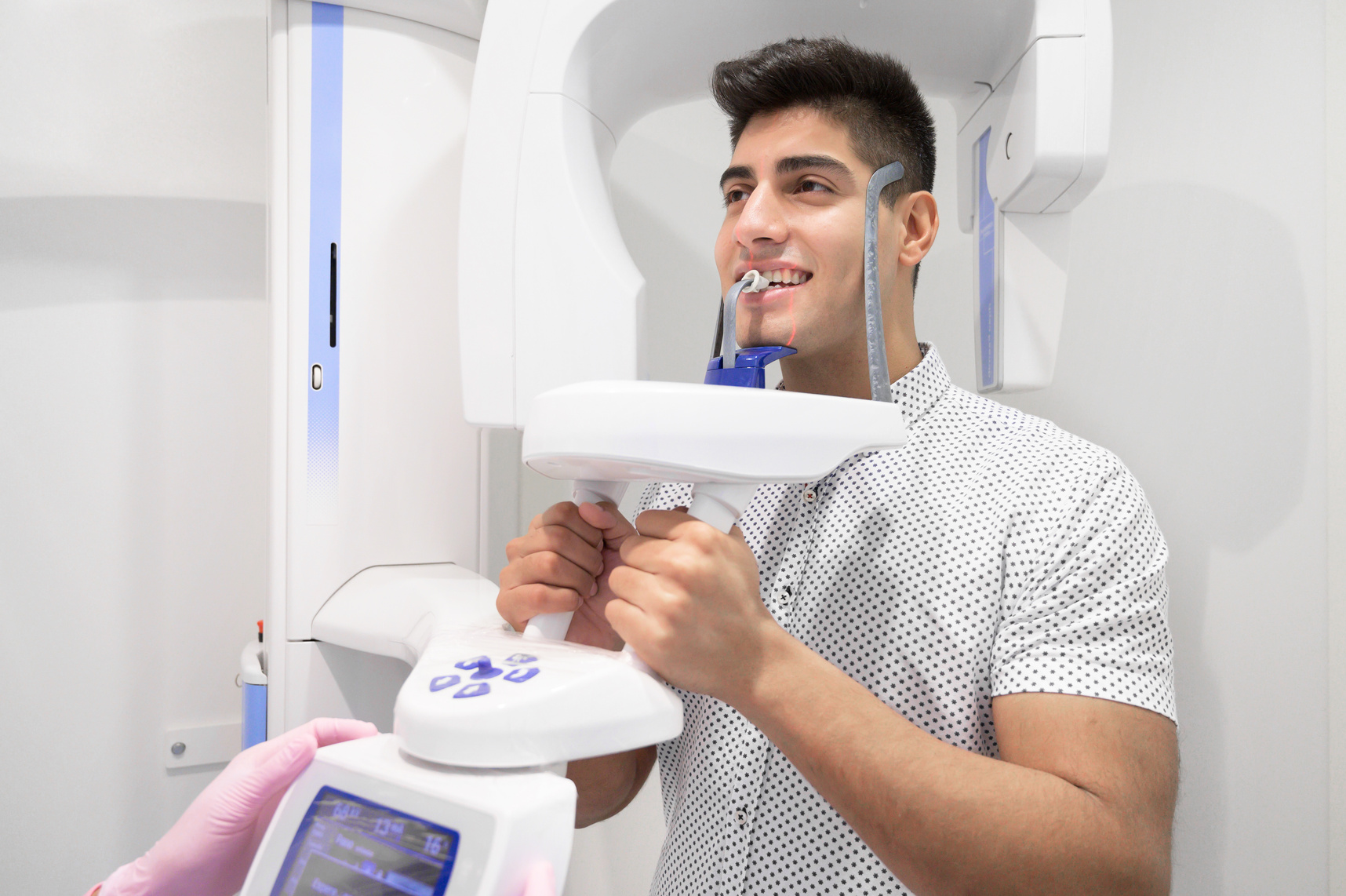 Man Patient Standing in X-Ray Machine
